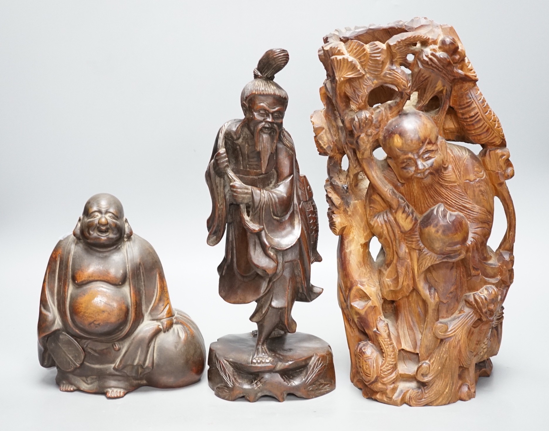 Two Chinese wooden figures and a Bizen pottery figure